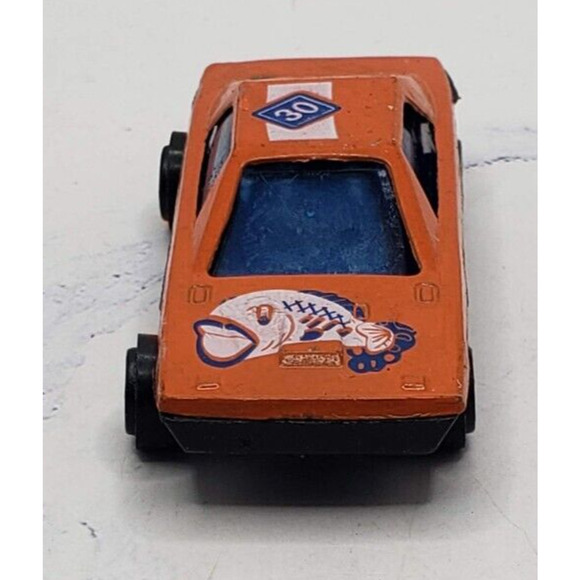 Diecast Orange Sports Car With Fish Theme on Hood - Picture 2 of 6